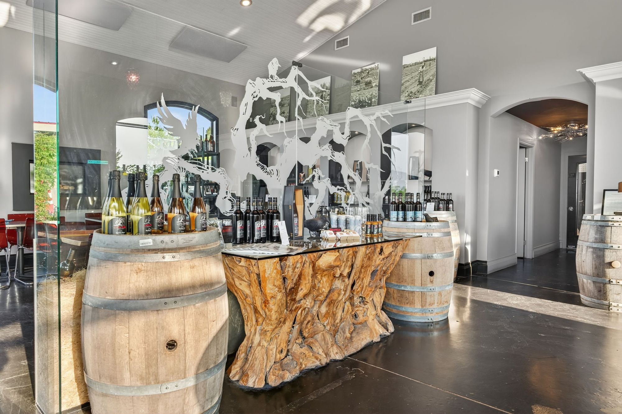 Bottles and barrels by the entrance of the tasting room