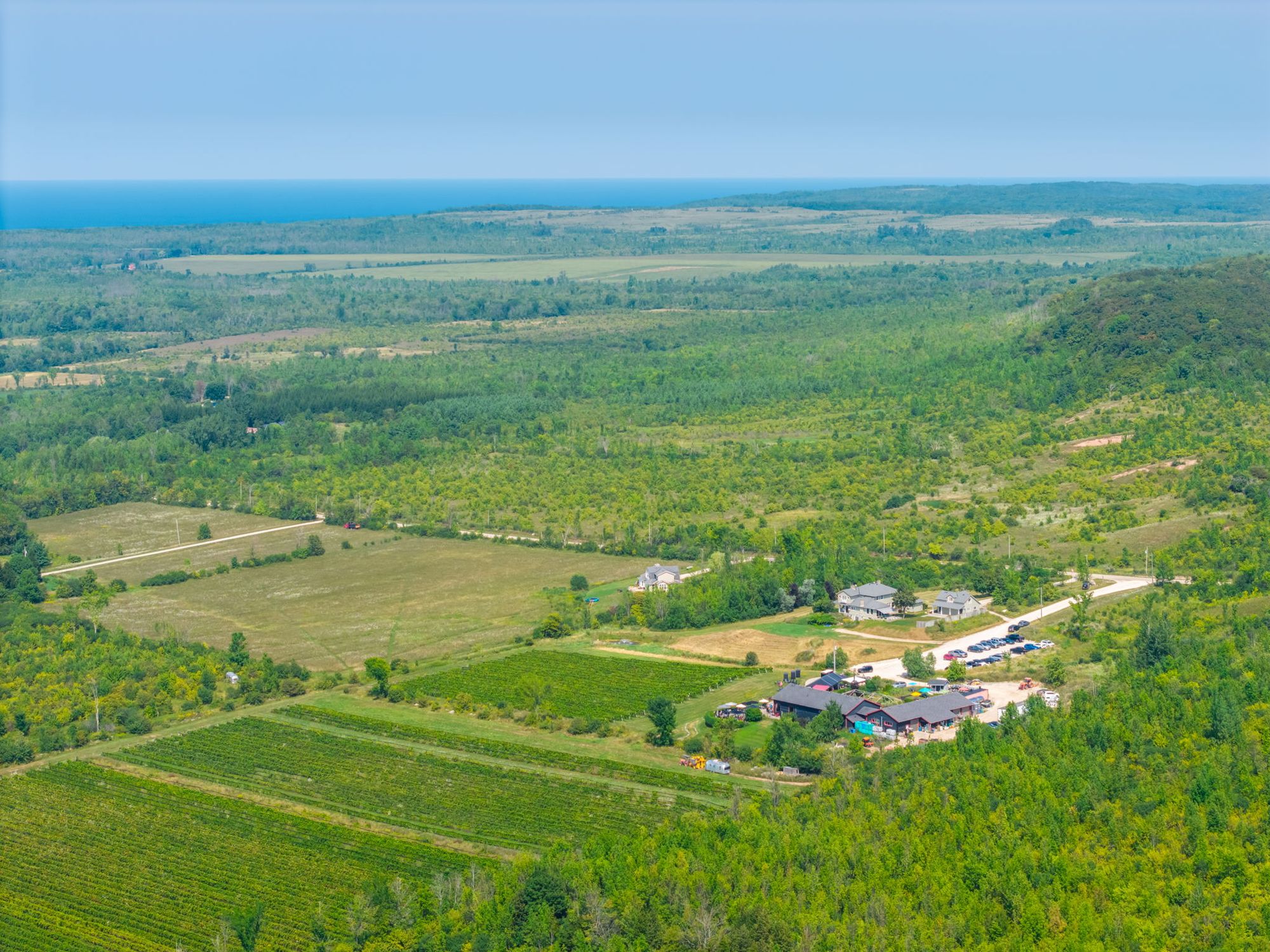 Farmland and forest rolling down to Georgian Bay