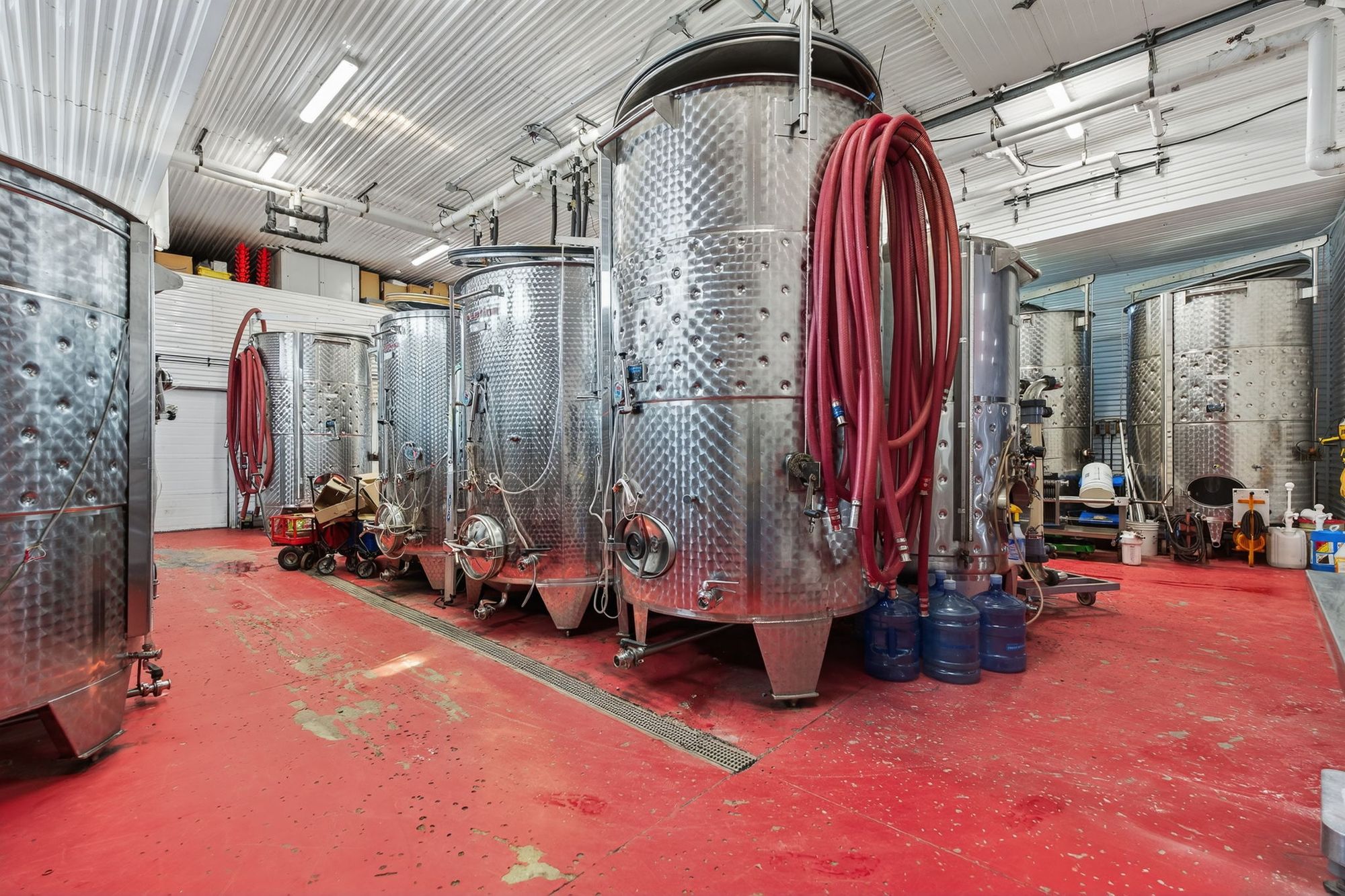 Stainless steel tanks in the winery's production room
