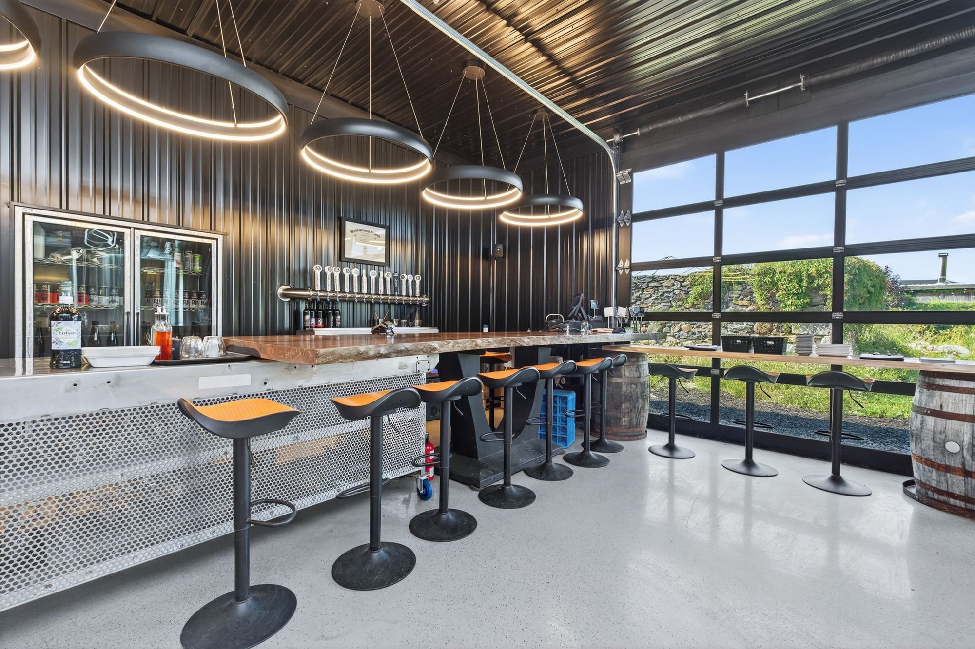 Stools at the taproom's window bar